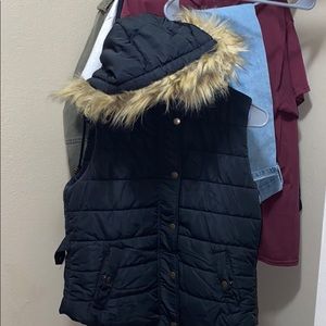 Super nice black vest with furry lining on hood